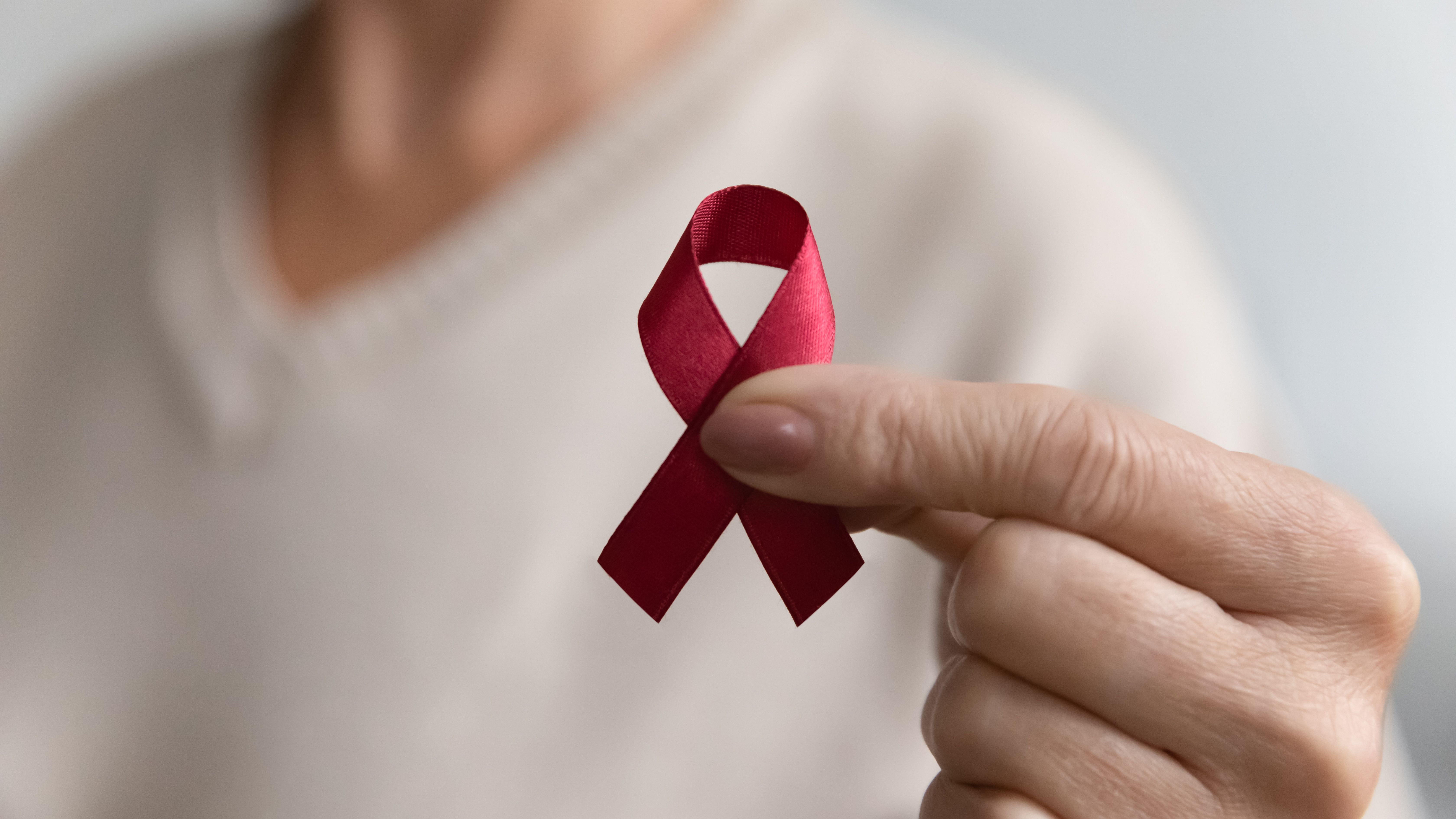 Red ribbon for HIV/AIDS awareness -- Image credit: fizkes | stock.adobe.com
