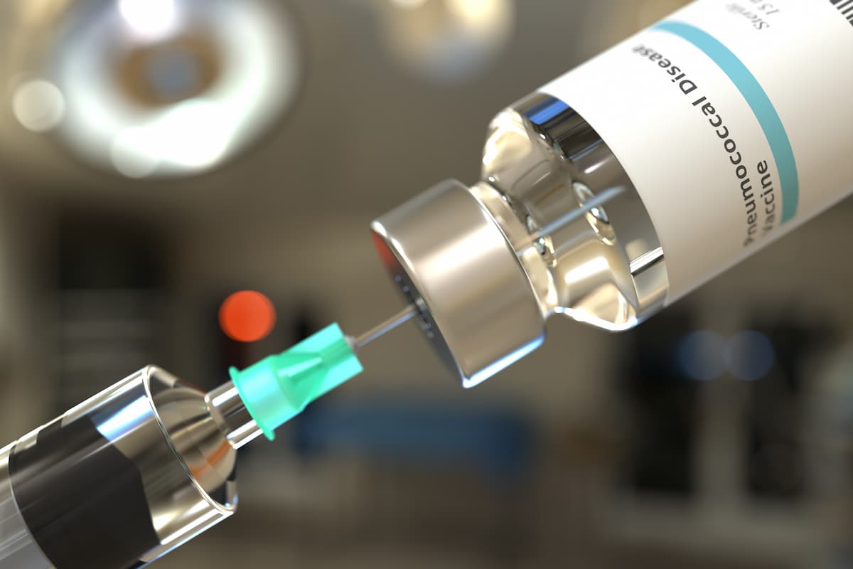 Vial with pneumococcal disease vaccine and syringe for injection. 3D rendering