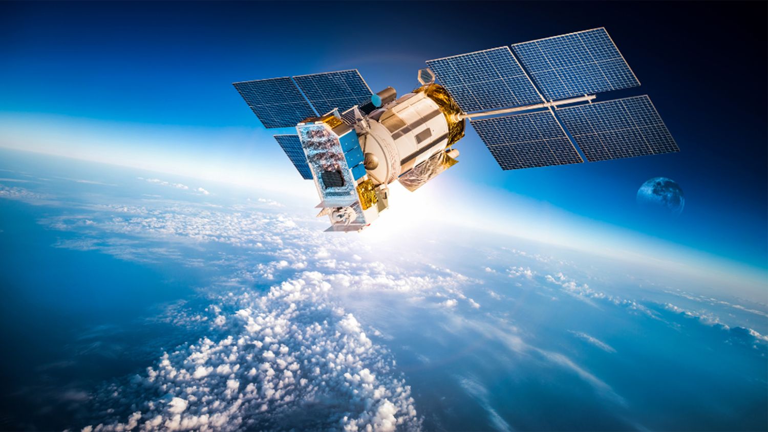 Image of a satellite in orbit above the Earth