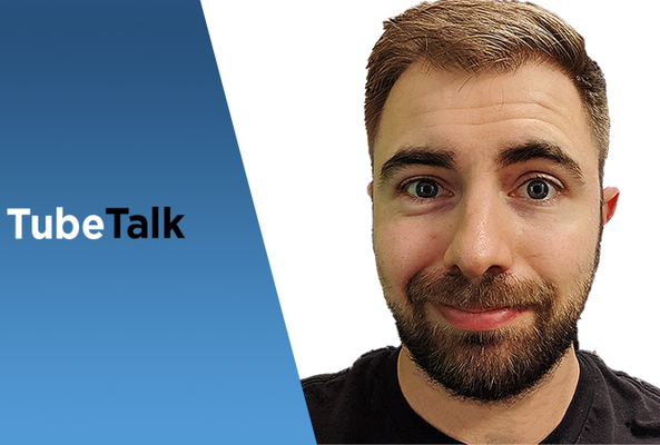 Smiling man with beard next to TubeTalk logo on blue and white background