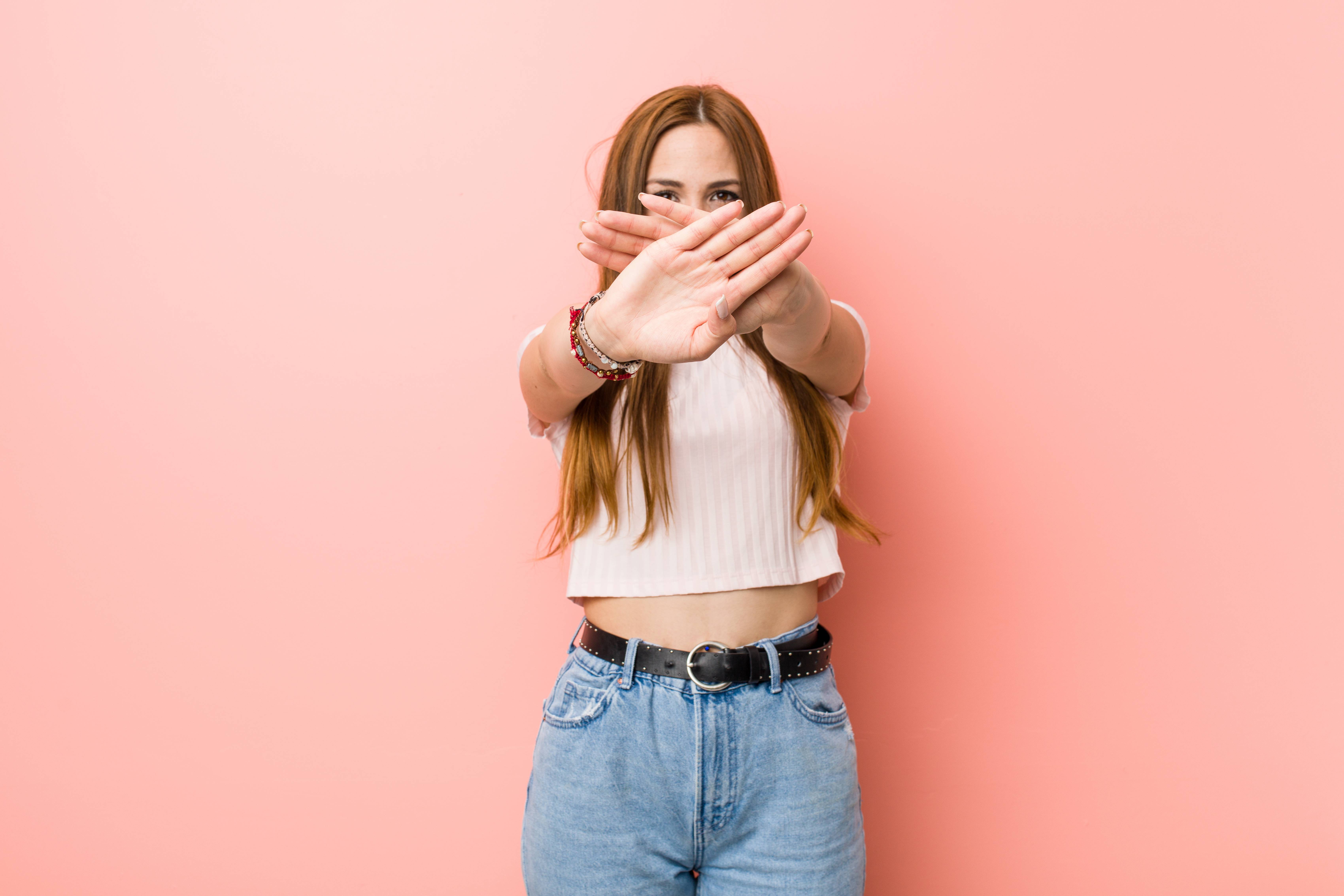 Girl crossing her palms