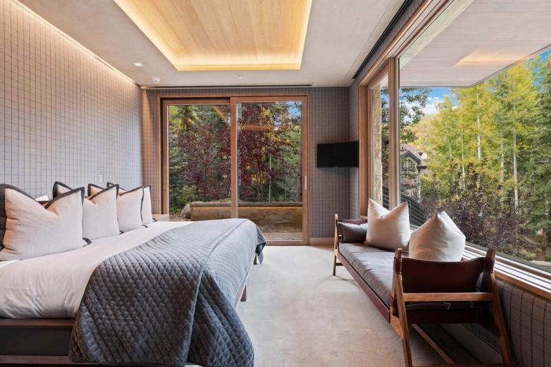 Beautiful views from the primary bedroom of this Vail Valley vacation rental home