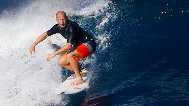 Surfer and theoretical physicist Garrett Lisi surfing in Fiji in 2019.