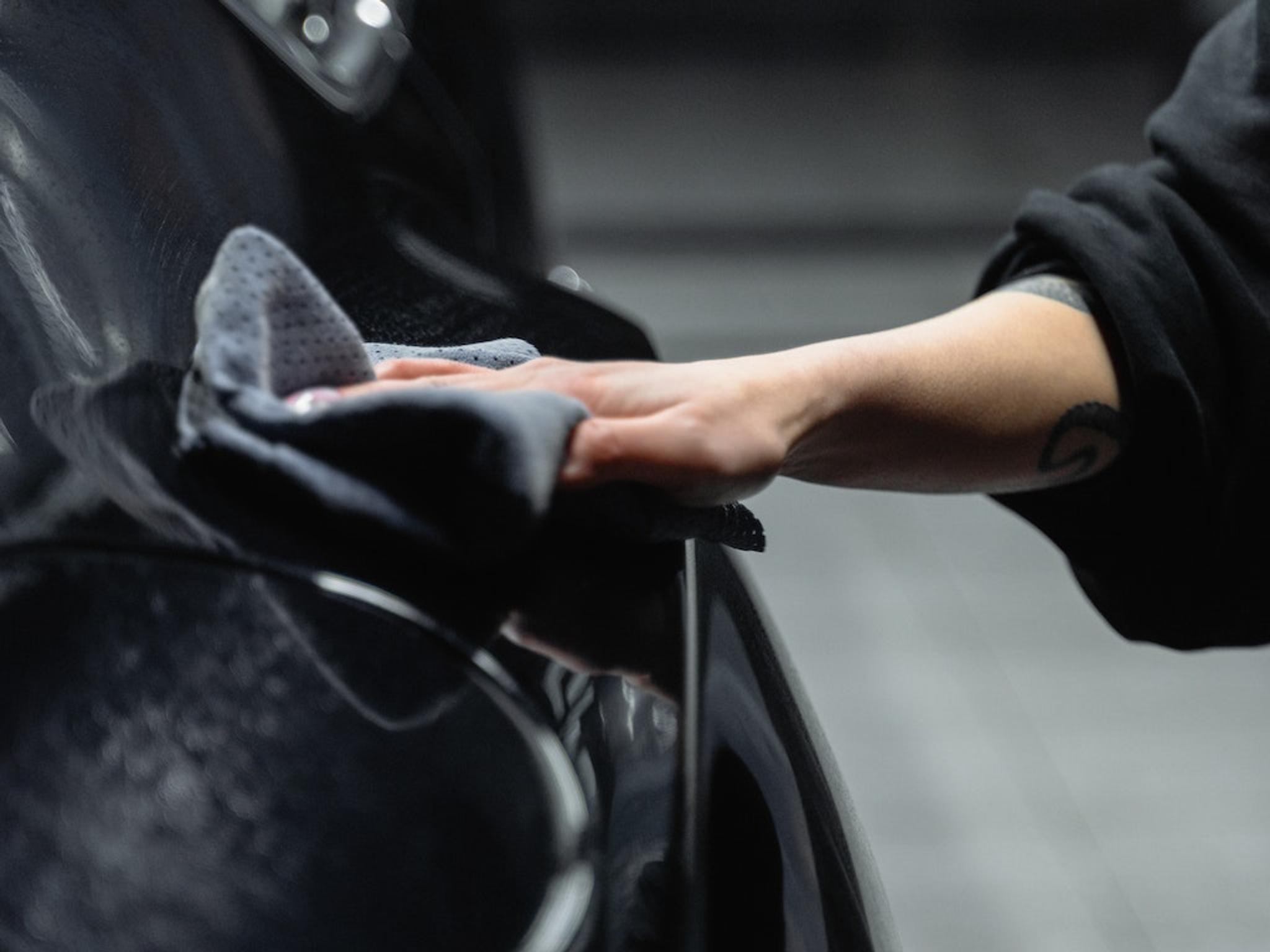 Black paint protection film maintenance