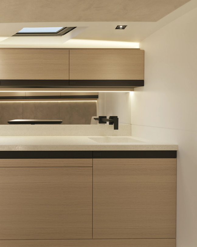 sleek bathroom sink with skylight and